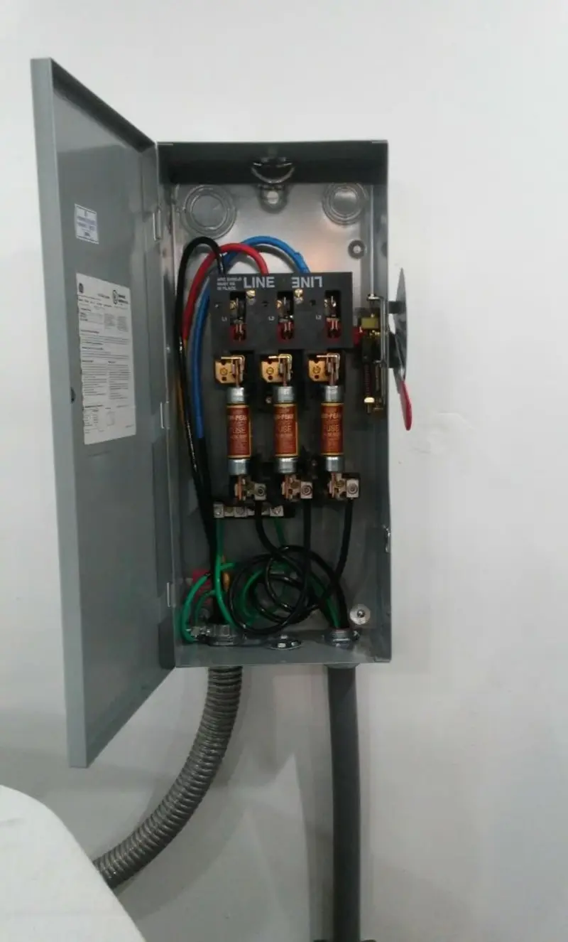Three-phase disconnect switch installed for Smoke Detector Installation in Walsenburg