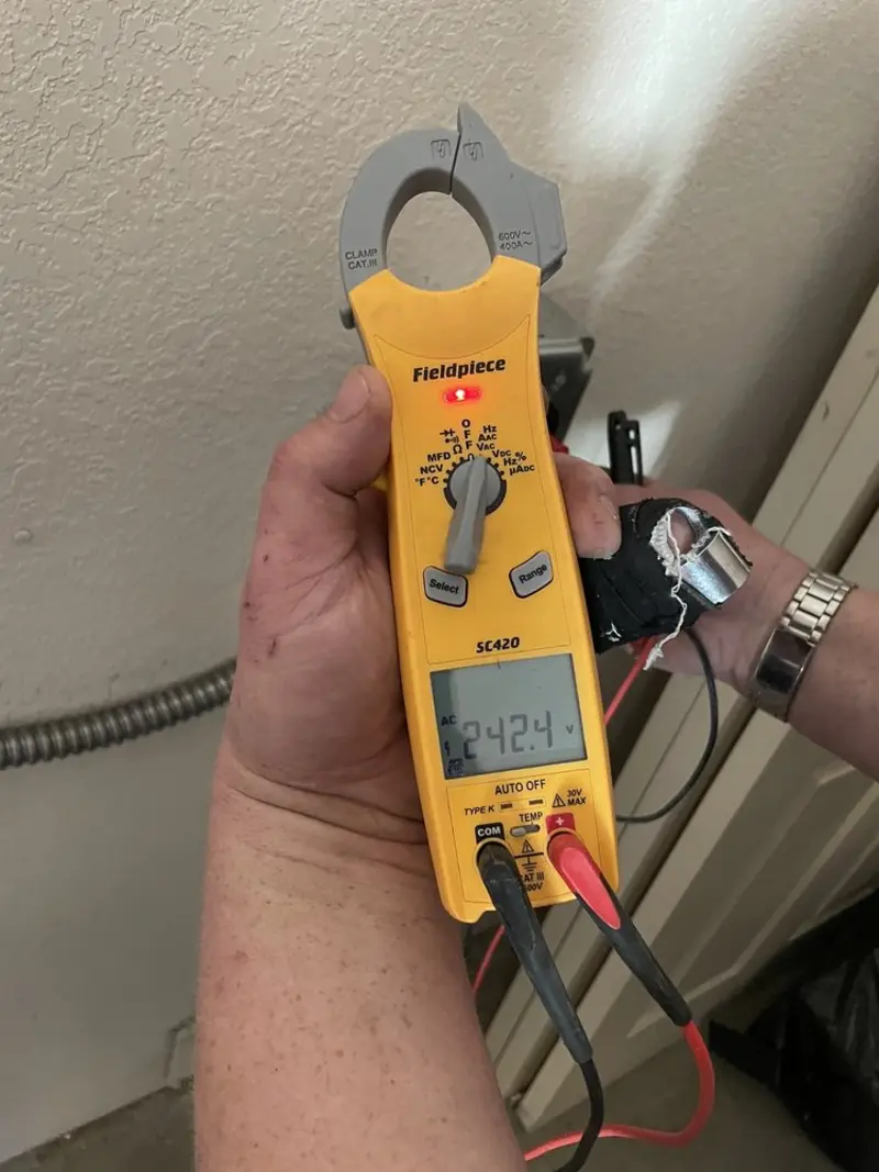 Voltage testing with clamp meter during Generator Installation in Walsenburg